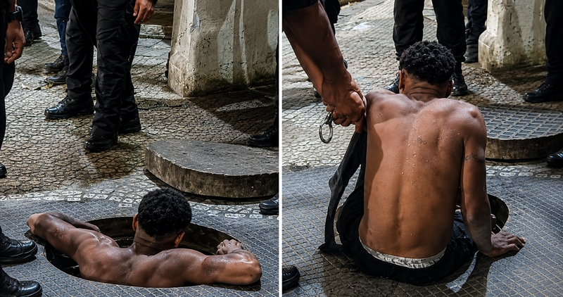 Dois homens foram presos após serem flagrados dentro de um bueiro tentando furtar cabos de energia na Rua do Rosário, no Centro do Rio.